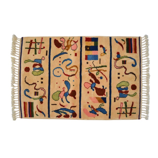 Woven in Turkey during the 1990s, this exceptional hand-knotted area rug serves as a striking homage to Wassily...