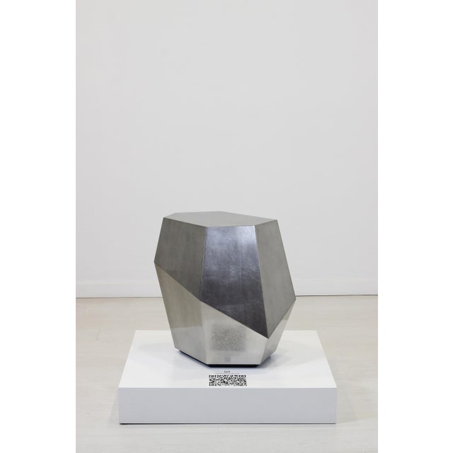 Three Rocks High Side Table in Aged Silver Leaf from Insidherland, in New conditions. Designed from 2000 Labeled by Maker