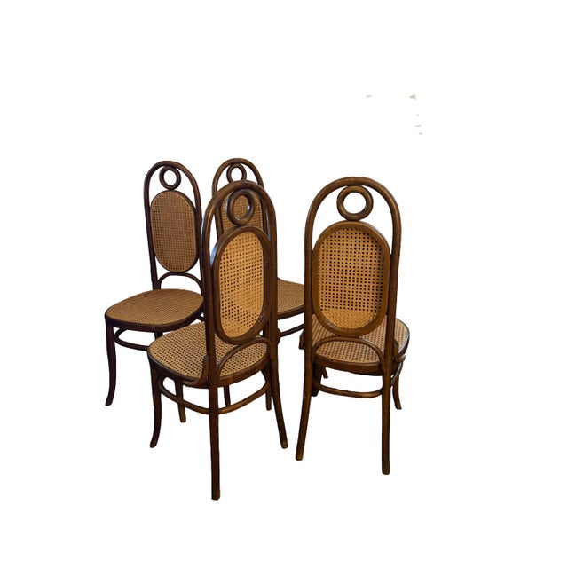 Set of Four Model 17 bentwood dining chairs by Thonet first produced in Vienna in 1904.