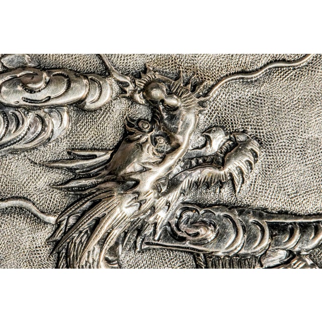 An extraordinary example of late 19th-century Chinese export silver, this circa 1880 900 sterling silver card case is a...
