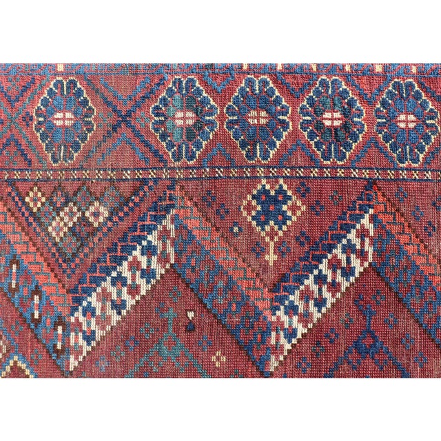 Measures: 6'0 x 10'5 Antique Turkestan Beshir Rug with Deep Red Field and Repeating Diamond Motifs. Keivan Woven Arts/...