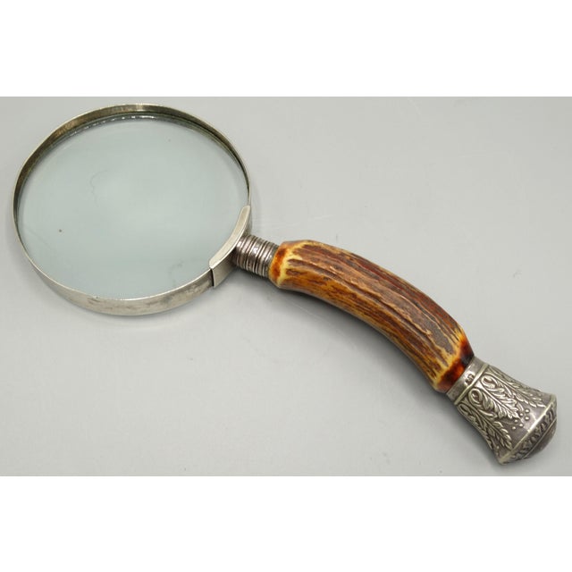 A fine quality antique English natural stag horn handled magnifying glass with silver mounts, likely Sheffield. It has...