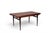 A breathtaking 1950s Danish draw leaf dining table by Johannes Andersen for Uldum Møbelfabrik in rich Brazilian rosewood....