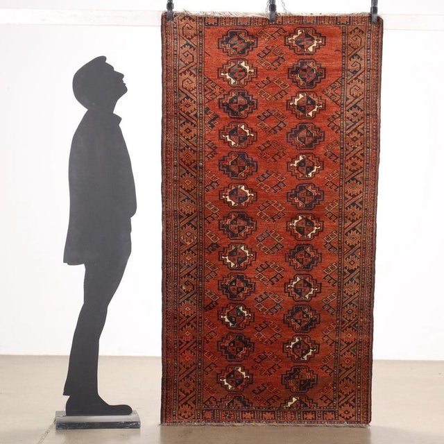 Bukhara rug in cotton and wool, large knot, manual production. This piece is attributed to the mentioned designer/maker....