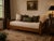 Charming antique American trundle bed crafted from walnut, featuring a warm aged finish, low-profile construction, turned...