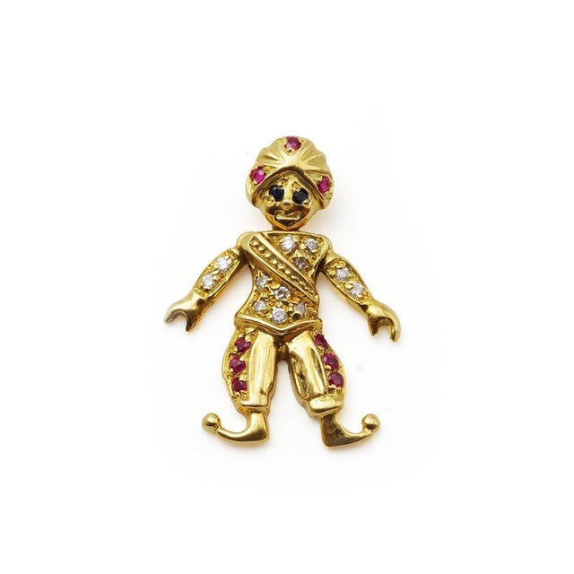 French articulated sultan pendant in 18 karat gold. Pendant depicting a caliph or sultan wearing a turban. The piece is...