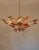 A spectacular monumental vintage crystal flower chandelier in the French Hollywood Regency tradition, closely matching...