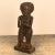 A 20th Century carved wood ancestry figure, Africa on a later custom steel stand.