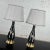 Wonderful mid-century modern black ceramic lamps with harlequin diamond style designs on front and new gray tapered drum...