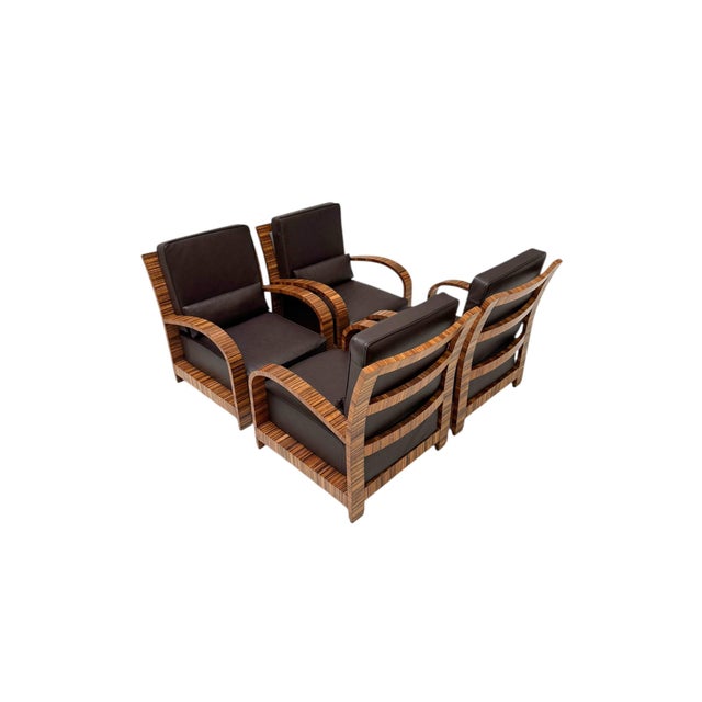 Magnificent and rare set of four Art Deco lounge chairs. Striking French design from the 1930s. Original zebrano veneered...