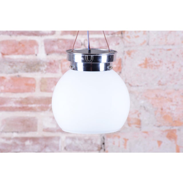 This elegant ceiling lamp is a classic example of 1930s Czechoslovak design, which was strongly influenced by the ideas of...