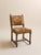 These dining chairs pair richly patterned tapestry upholstery with carved wood frames and turned barley twist stretchers,...