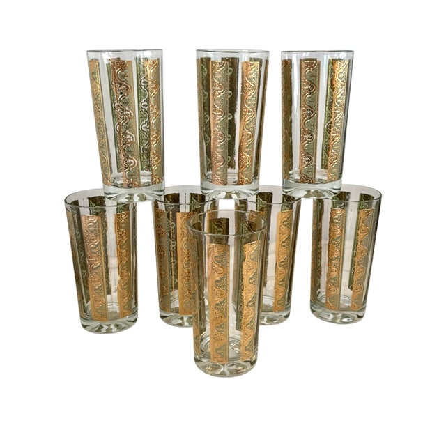 A great set of 8 glass tumblers. Mid century gold and green stripe design. Perfect for the bar!