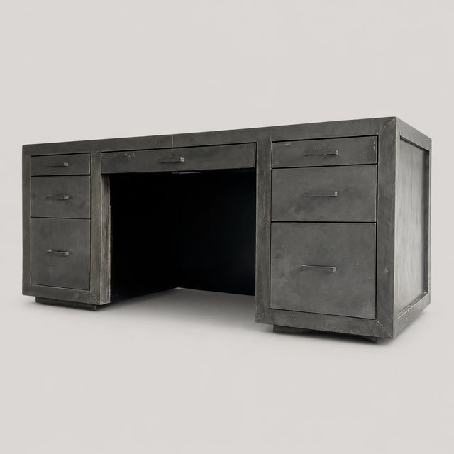 A substantial La Salle desk by Restoration Hardware, inspired by the clean proportions and utilitarian character of 1940s...