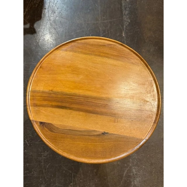 This 19th century Italian walnut pedestal table is a timeless piece of antique furniture that exudes elegance and charm....