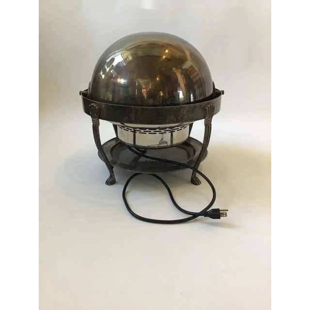 Pair of large silver plate electric chafing dishes. Never used. With water pan and food pan. In 1992 the cost was 1875.00.