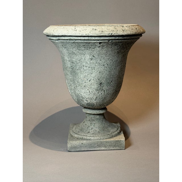 This exquisite antique cast stone garden urn, inspired by Victorian-era English jardinieres, is a stunning example of...