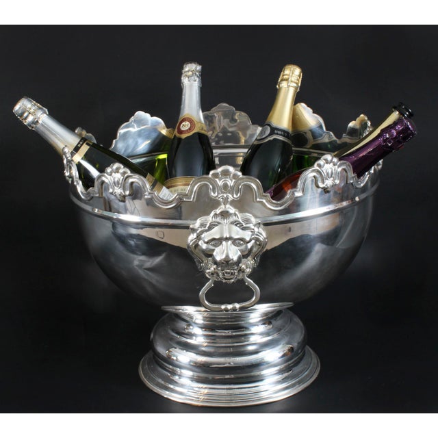 This is a large Vintage silver plated Monteith punch bowl dating from the late 20th Century. The punch bowl can also...