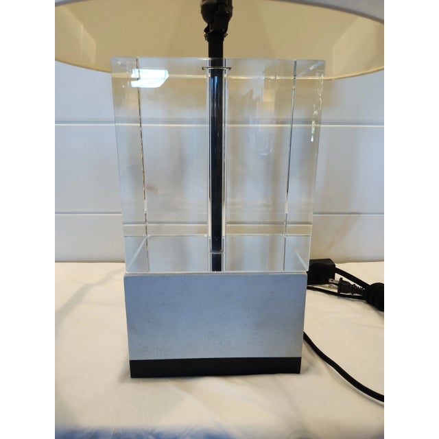 Baker's Glacier Table Lamp from The Milling Road Collection designed by Darryl Carter. The base features a clear Crystal...