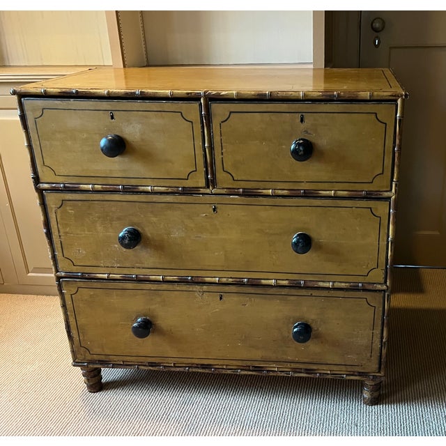 Antique 19th century Regency carved and paint decorated faux bamboo chest of drawers, England circa 1830. Wonderful ochre...