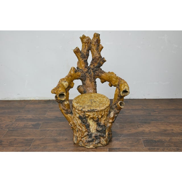An English terracotta coral inspired Grotto chair from circa 1900. This whimsical English terracotta Grotto chair from...