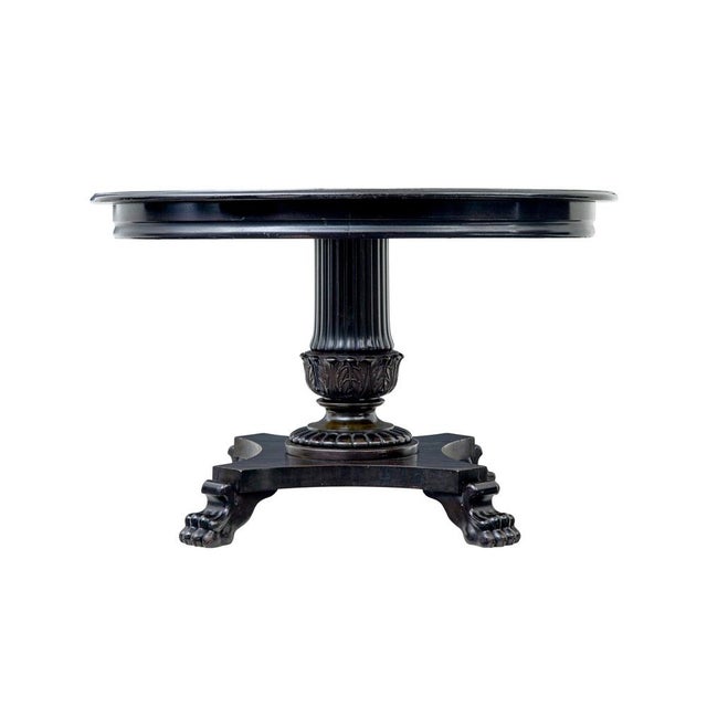 19th century carved blackened oval center table circa 1890. Striking and good quality oval occasional table. Oval top with...