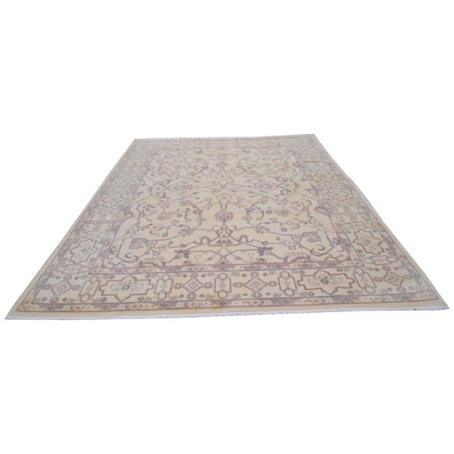 Hand-knotted with care using traditional rug-making techniques, this wool rug blends timeless craftsmanship with a modern...