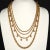 This is part of Chairish’s Costume Jewelry assortment. Vintage Napier necklace with several different types of chains in...