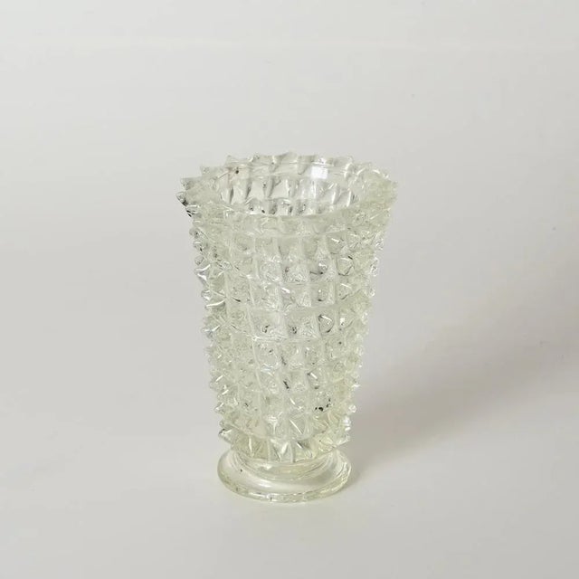 Fantastic mouth-blown rostrato crystal Murano glass vase. This marvelous decorative piece was realized during the 1940s in...