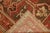 Early 20th century Kurdish with a tribal all-over design on a chocolate brown field with accents in a rusty brick red,...