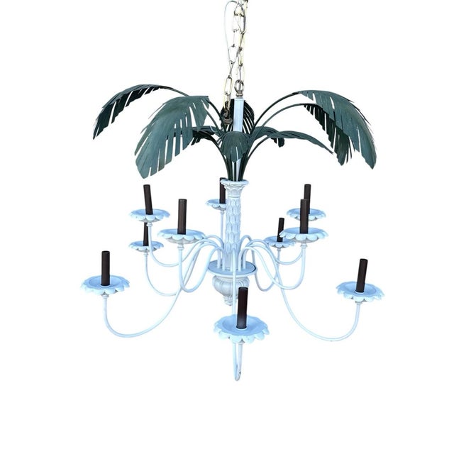 This is a vintage palm tree chandelier. It is in good condition. Perfect addition to a beach home.