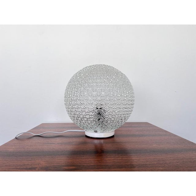 One bulb any wattage. Perfect original condition. No damages. Marked by manufacturer jr. This piece is attributed to the...