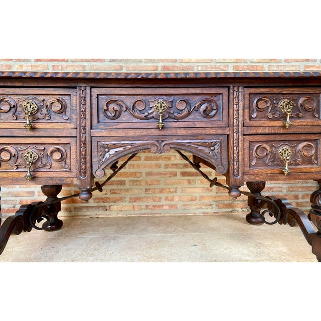 Brown 19th Century French Renaissance Hand Carved Desk or Writing Table with Carved Structure and Iron Stretcher For Sale - Image 8 of 18