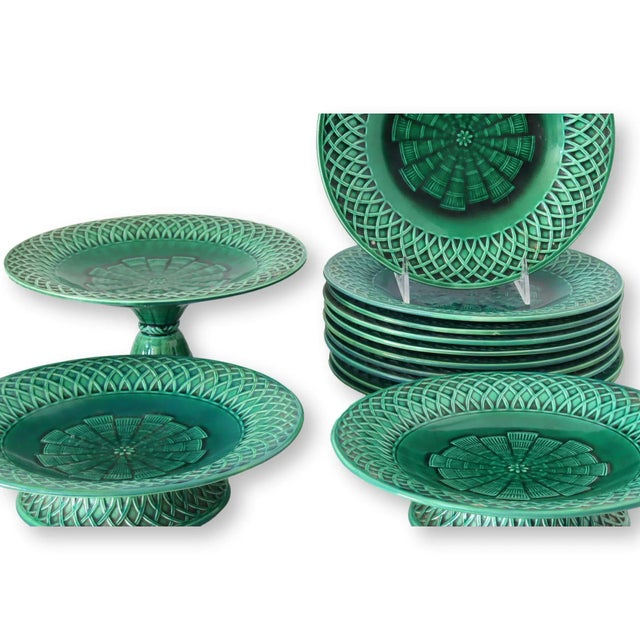 A rare and highly collectible Mintons Majolica dessert service designed in 1867 by Dr. Christopher Dresser—one of the most...