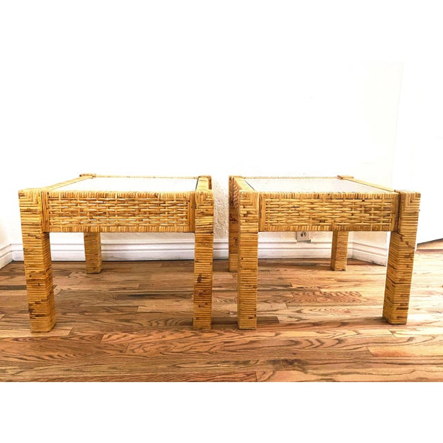 Vintage rattan side or end tables with glass tops. Bohemian Style made in America in the late 1980s. Very good condition....