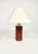 Two-lights table lamp in amber glass and metal by Poliarte. Made in Italy in the 1970s. Measures: Height without...