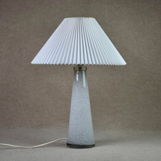 The glass measure: High 32,5, ø 12 cm. Hyllinge Glasbruk started 1962 and was closed 1978. Bengt Orup worked as a designer...