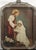 Striking 1938 First Communion devotional portrait presented in an elaborate silvered and polychrome floral frame. The...