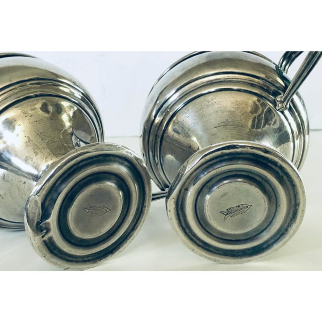 Tea time just got an upgrade with this lovely sterling creamer and sugar set made by the New York firm Arrowsmith, makers...