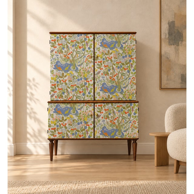 A striking Swedish 1950s cabinet, professionally finished in Josef Frank’s iconic Paradiset wallpaper. In excellent...