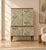 A striking Swedish 1950s cabinet, professionally finished in Josef Frank’s iconic Paradiset wallpaper. In excellent...