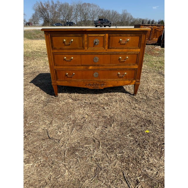 19th Century French Louis XVI Commode from France. Made of solid walnut, the wood has been finished with a lustrous French...