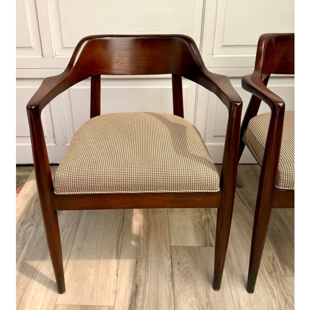 Here is a handsome pair of 1960s mid-century modern armchairs by Gold Desk & Safe Co. of Los Angeles, California. Crafted...