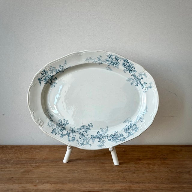 Late Victorian English ironstone platter by Edge, Malkin & Co, decorated with delicate blue floral transferwork and molded...