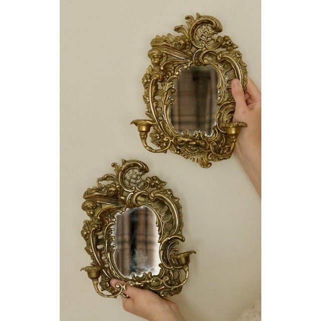 Made and Sourced from Sweden Classic candle wall sconces with mirrors, heavy brass design with beautiful detail. In good...