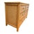 Beautiful vintage wicker dresser by Henry Link, featuring a warm honey-tan finish and intricate woven rattan detailing....