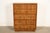 A gorgeous Mid-Century Modern Hollywood Regency Campaign style highboy dresser or chest of drawers By Drexel USA, 1970s...