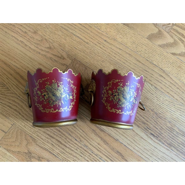 A beautiful pair of early 20th century, red and gold toleware Monteith cachepots. Done in the French Napoleon III style...