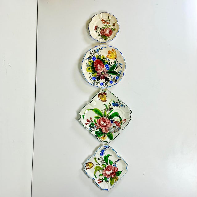 We have here a set of 4 Vintage Italian Pottery Plates Finished in Faience high-gloss glaze. Each features a Note Rose...