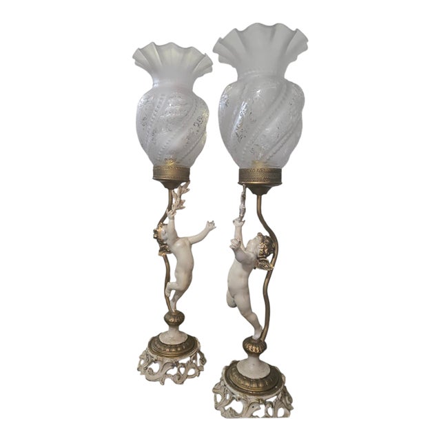 Early 20th-Century Cast Metal and Hand-Painted Cherub Lamps - Pair For Sale